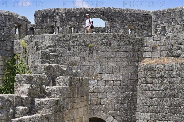 Tourist Walking On The Castle Ramparts Photo12 imageBROKER G M Therin 