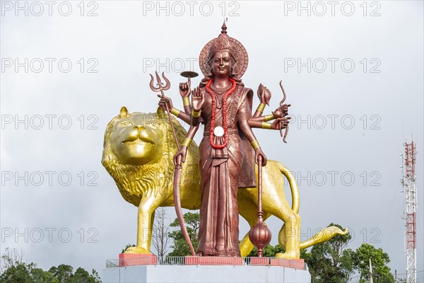 Statue of Goddess Mahalaxmi at the sacred lake of Ganga Talao in the south of the island of Mauritius