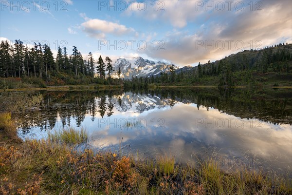 Mt. Shuksan glacier with snow reflecting in Picture Lake