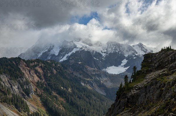 Cloudy Mt. Shuksan with snow and glacier