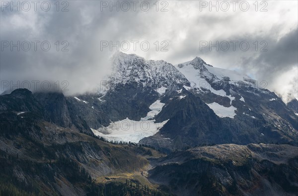 Cloudy Mt. Shuksan with snow and glacier