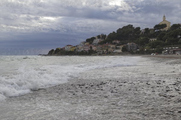 Strong swells during storm break on seawall in Sanremo