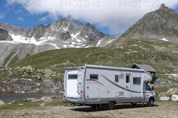 Motorhome in alpine landscape near Nufenen Pass