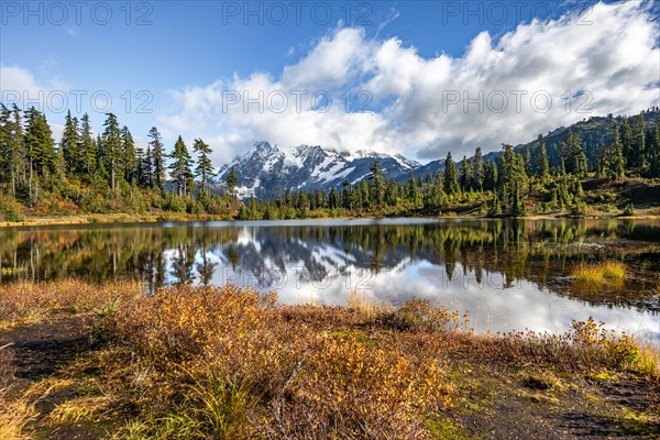 Mt. Shuksan glacier with snow reflecting in Picture Lake