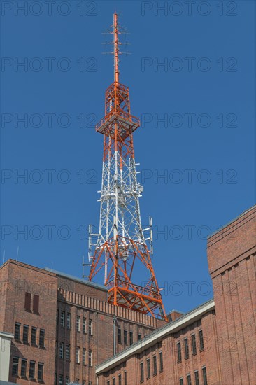 Transmission mast on the roof of the telecommunications office of Telekom