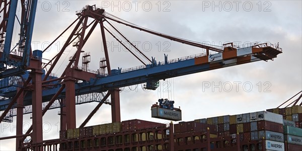 Container being loaded onto a container ship at the container gantry crane at the Eurogate container terminal