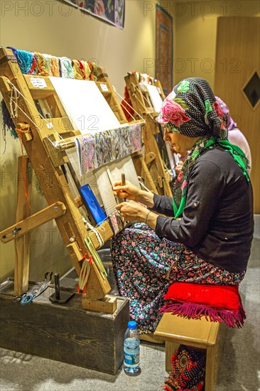 Woman at the loom