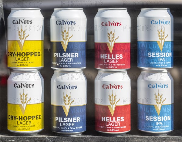 Shop window display of Calvors beer and lager cans