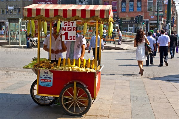 Bazaar street with corncob seller