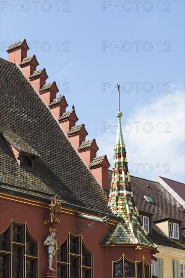 Stepped gable and bay window with coloured roof tiles