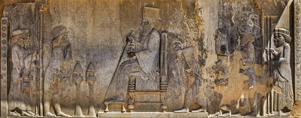 Relief of King Darius enthroned under a canopy