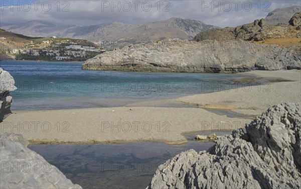 Sandy beach Ammoudi Beach