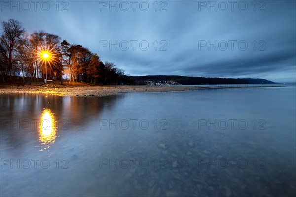 Storm warning light in the morning during a storm at Lake Constance