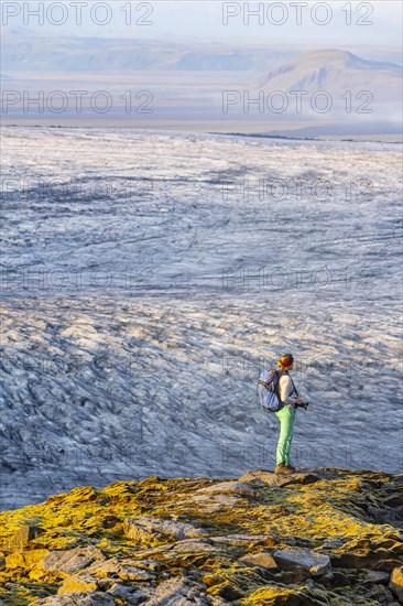 Hiker looks over spectacular landscape