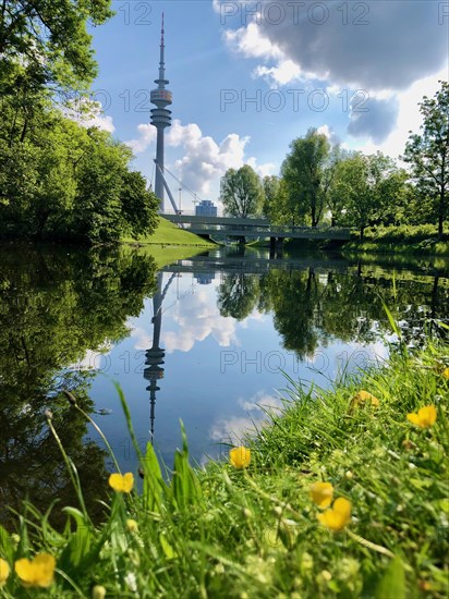 Olympic Tower reflected in the lake