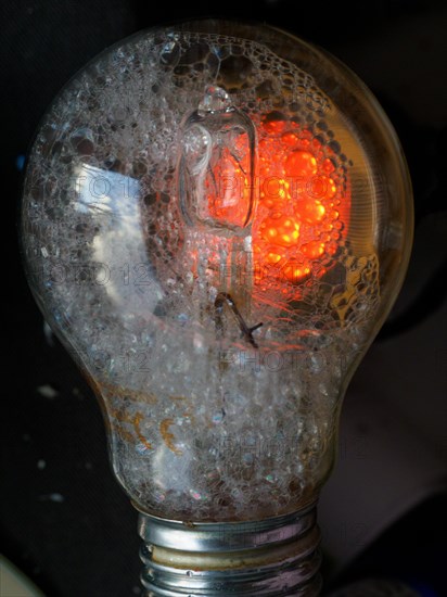 Light bulb filled with soap foam