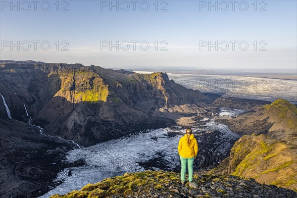 Hiker looks over spectacular landscape