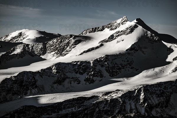 Snowy summit of Monte Cevedale at blue hour