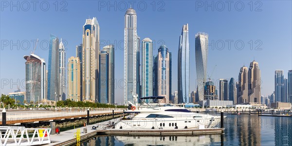 Dubai Marina and Harbour Skyline Architecture Luxury Holidays in Arabia with Boat Yacht Panorama in Dubai