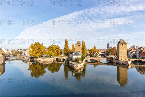 Petite France bridge over river Ill water with tower text free space Copyspace Alsace in Strasbourg