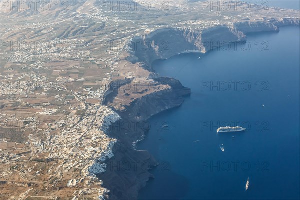 Santorini island holiday travel town Fira Thera on the Mediterranean Sea aerial view in Santorini