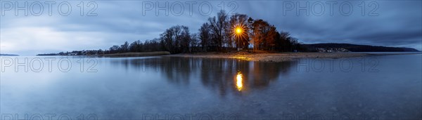 Storm warning light in the morning during a storm at Lake Constance