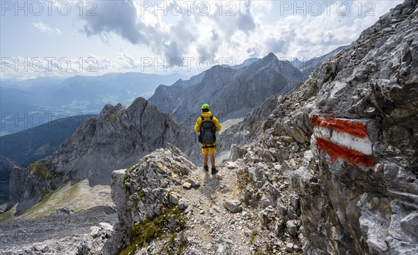 Hiker on hiking trail to Lamsenspitze