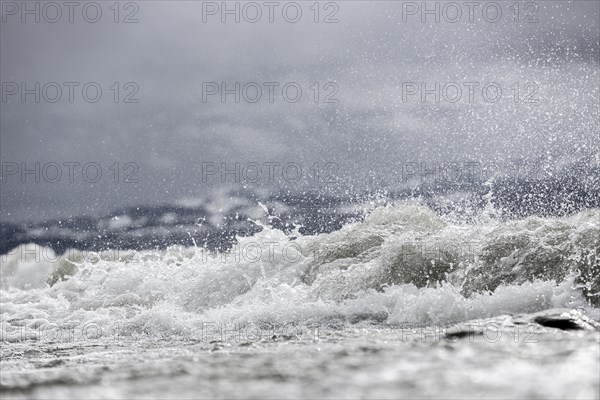 Storm Lolita raging on the stony shore in Hagnau