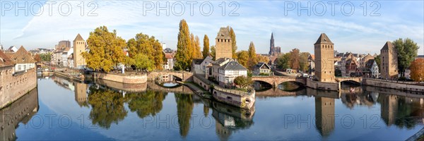 Petite France Bridge over River Ill Water with Tower Panorama Alsace in Strasbourg