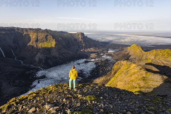 Hiker looks over spectacular landscape