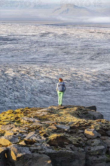 Hiker looks over spectacular landscape