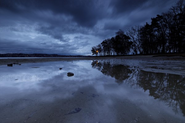 Storm warning light in the morning during a storm at Lake Constance