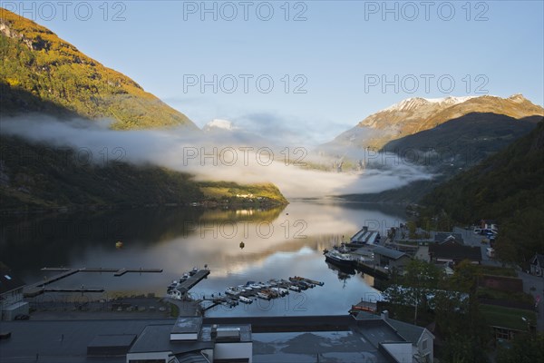 Rising fog in Geiranger Fjord
