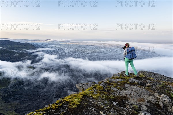 Hiker photographs spectacular landscape