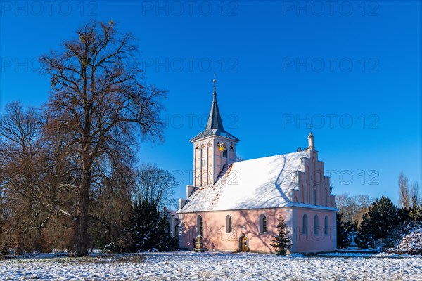 Village church in Lenne Park Criewen in winter