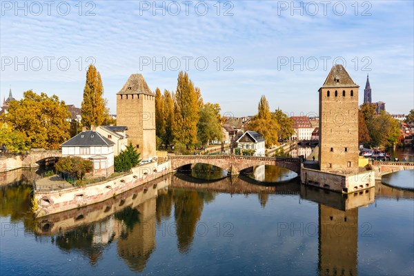 Petite France bridge over river Ill water with tower Alsace in Strasbourg
