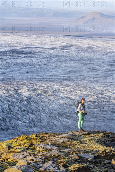 Hiker looks over spectacular landscape