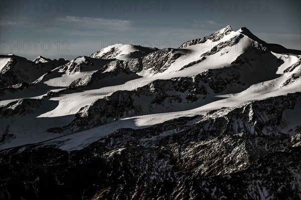 Snowy summit of Monte Cevedale at blue hour