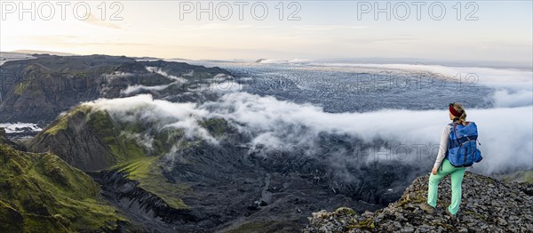 Hiker looks over spectacular landscape