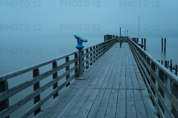 Jetty near Diessen am Lake Ammer in the fog