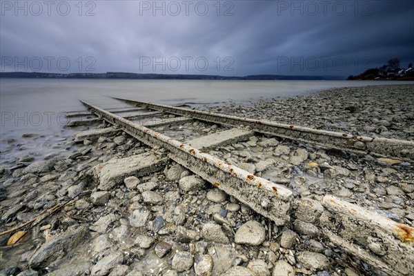 Old tracks lead into Lake Constance near Sturm