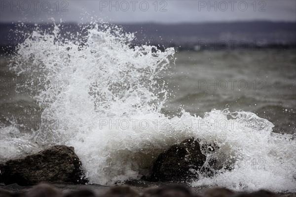 Storm Lolita raging on the stony shore in Hagnau