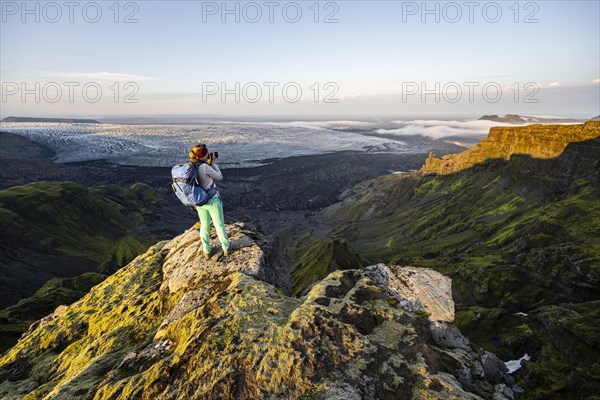 Hiker looks over spectacular landscape
