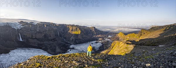 Hiker looks over spectacular landscape