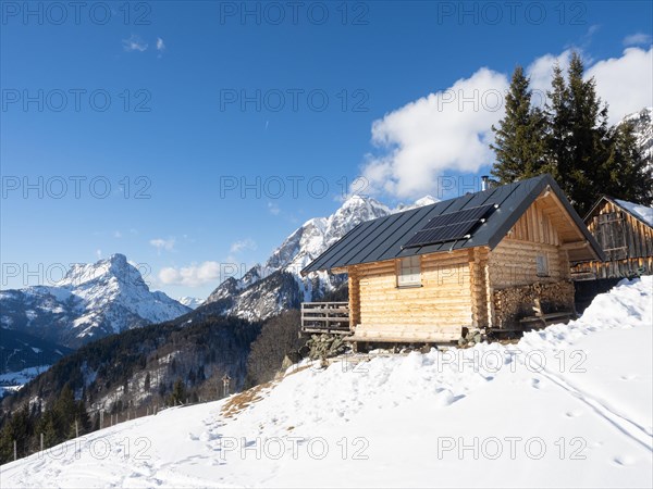 Hut in winter landscape