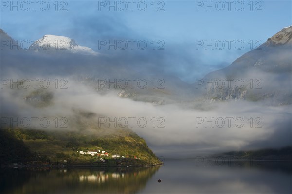 Rising fog in Geiranger Fjord