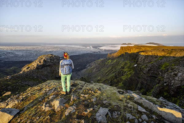 Hiker looks over spectacular landscape