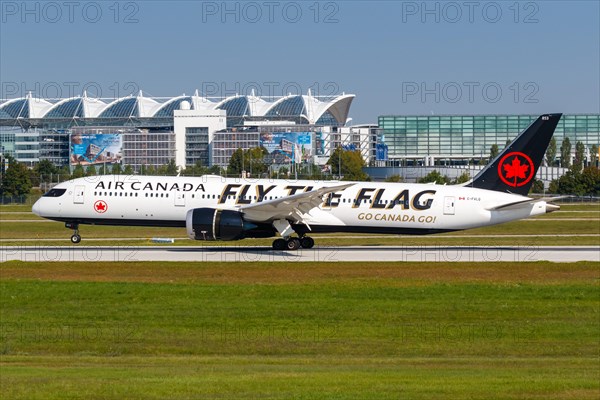 An Air Canada Boeing 787-9 Dreamliner aircraft with registration C-FVLQ and Fly The Flag special livery at Munich Airport
