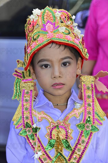 Splendidly dressed aspiring novice at novice ceremony