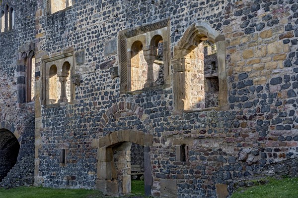 Facade of the Romanesque Muenzenberg Palas with windows and arcades